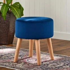 Emmy Navy Blue Velvet Round Wood Leg Ottoman -Furniture Store emmy navy blue velvet round wood leg ottoman 5